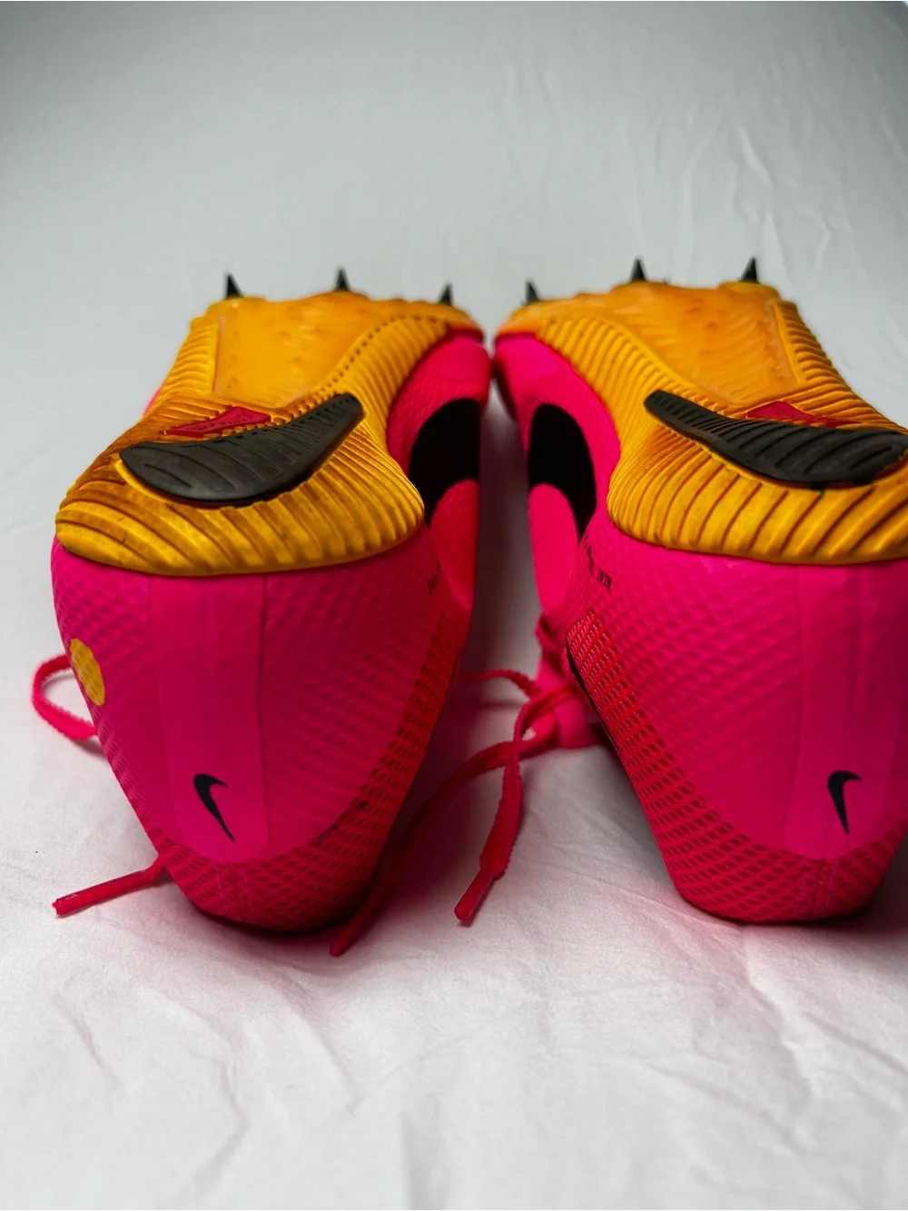 Nike Bright Pink Athletic track with Black Swoosh men’s 10/1/2